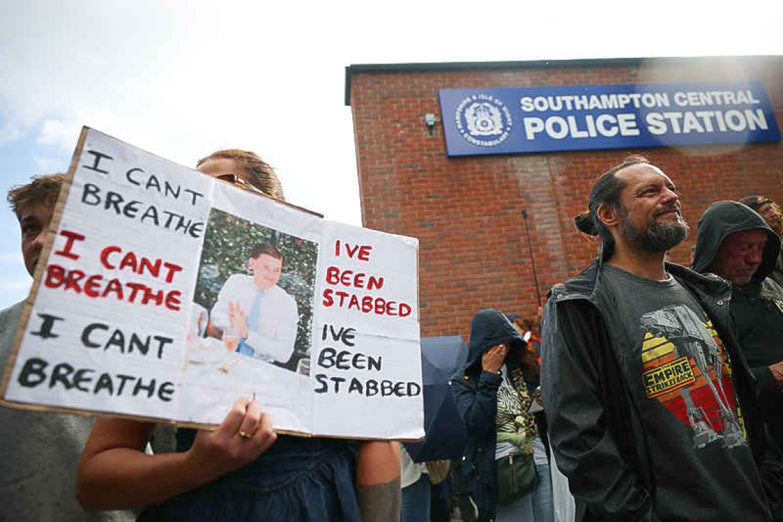 UK police under pressure after  dying student was handcuffed